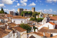 Generate a random place in Óbidos