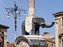 Generate a random place in Catania