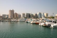 Generate a random place in Manama