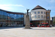 Generate a random place in Woking