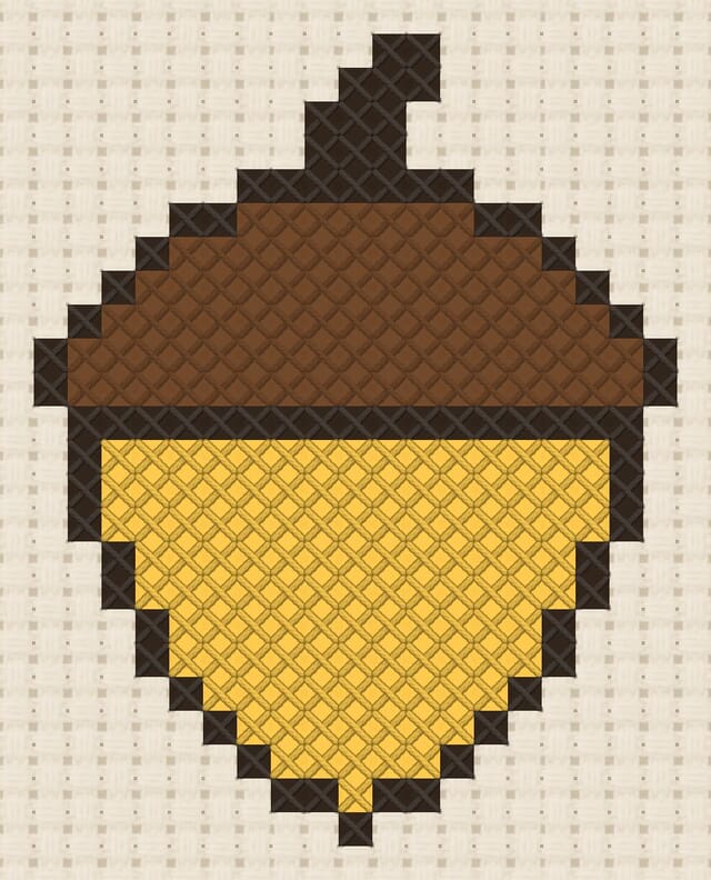 Acorn finished in cross stitch on Aida cloth