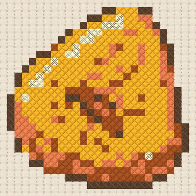 Amber specimen finished in cross stitch on Aida cloth