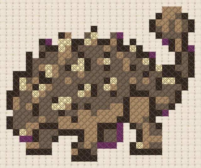 Ankylosaurus finished in cross stitch on Aida cloth