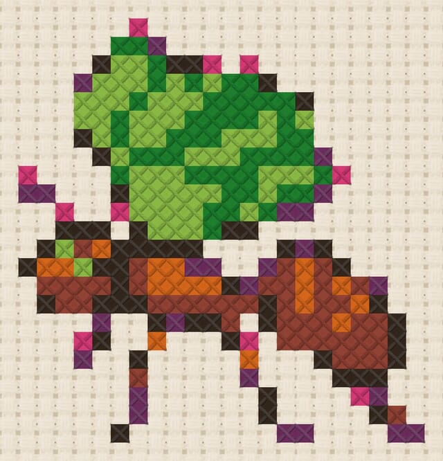 Ant with leaf finished in cross stitch on Aida cloth