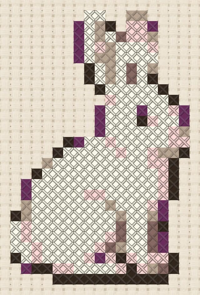 Arctic hare finished in cross stitch on Aida cloth