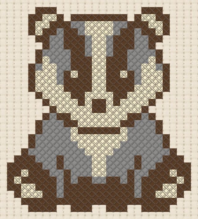 Badger finished in cross stitch on Aida cloth