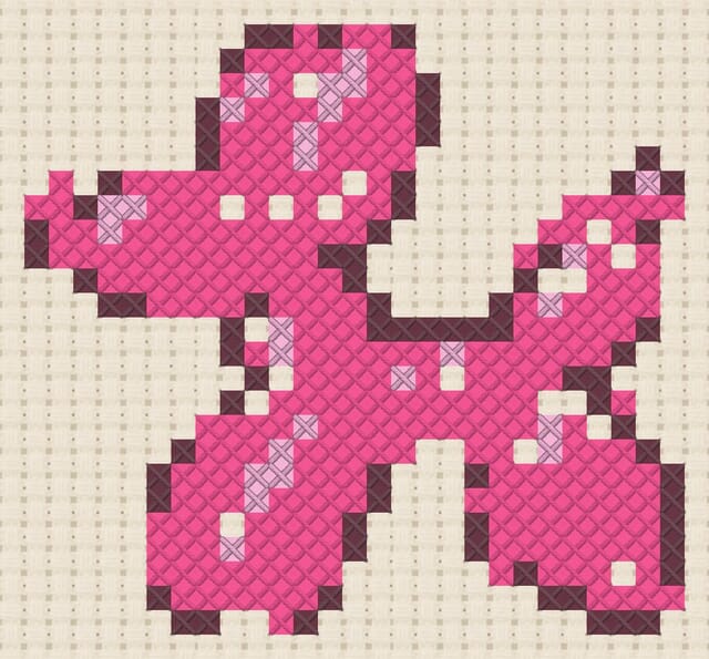 Balloon dog finished in cross stitch on Aida cloth