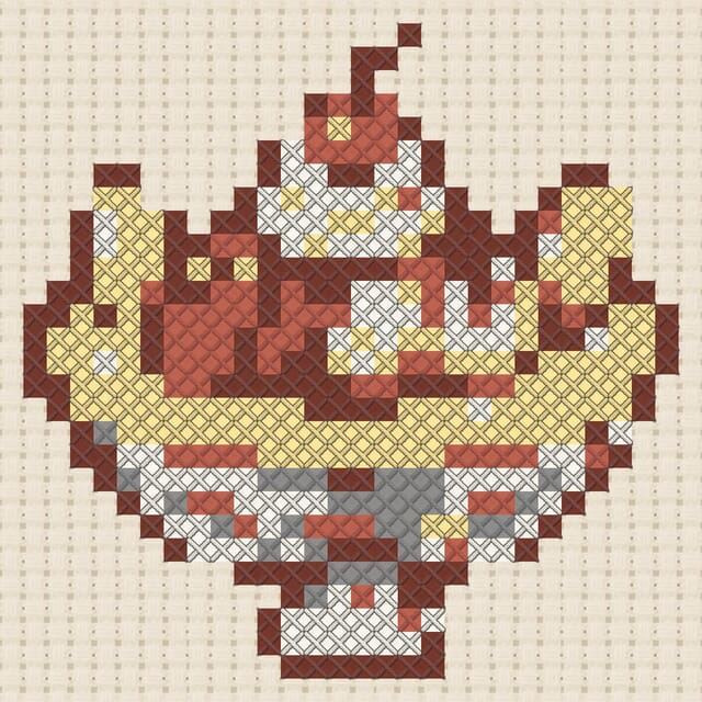 Banana split finished in cross stitch on Aida cloth