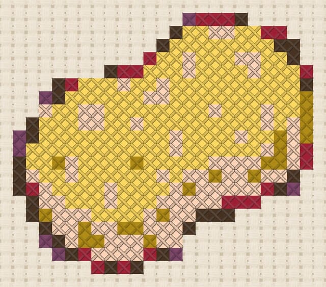Bath sponge finished in cross stitch on Aida cloth