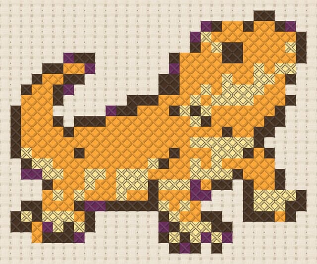 Bearded dragon finished in cross stitch on Aida cloth