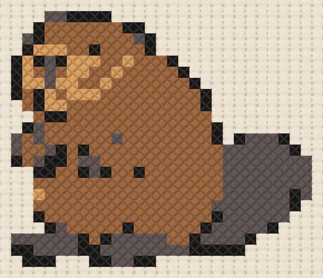 Beaver finished in cross stitch on Aida cloth