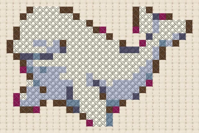 Beluga finished in cross stitch on Aida cloth