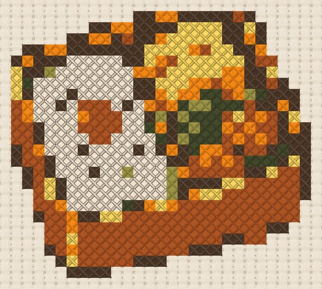 Bento box finished in cross stitch on Aida cloth