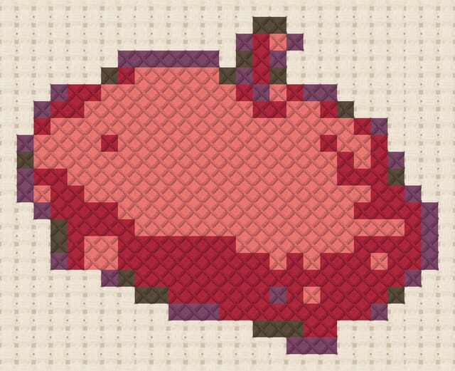 Beret finished in cross stitch on Aida cloth