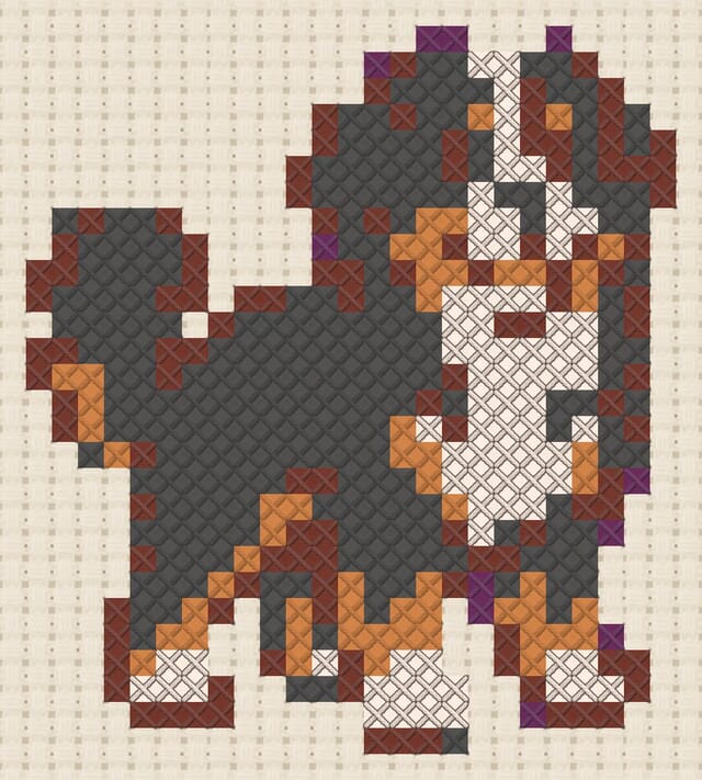 Bernese dog finished in cross stitch on Aida cloth