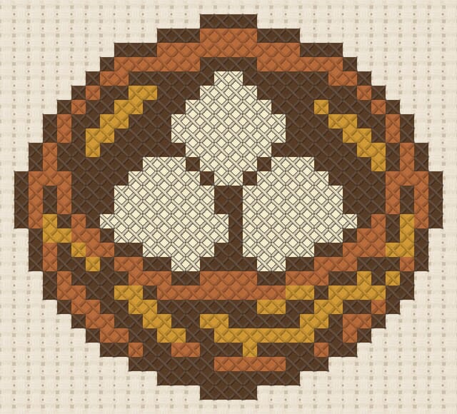Bird nest with eggs finished in cross stitch on Aida cloth