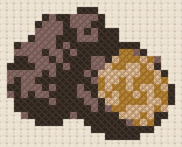 Black truffles finished in cross stitch on Aida cloth