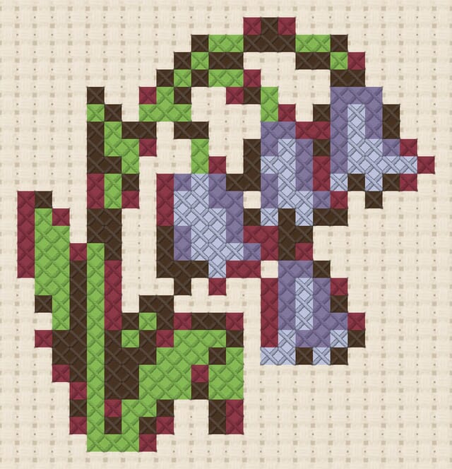 Bluebells finished in cross stitch on Aida cloth