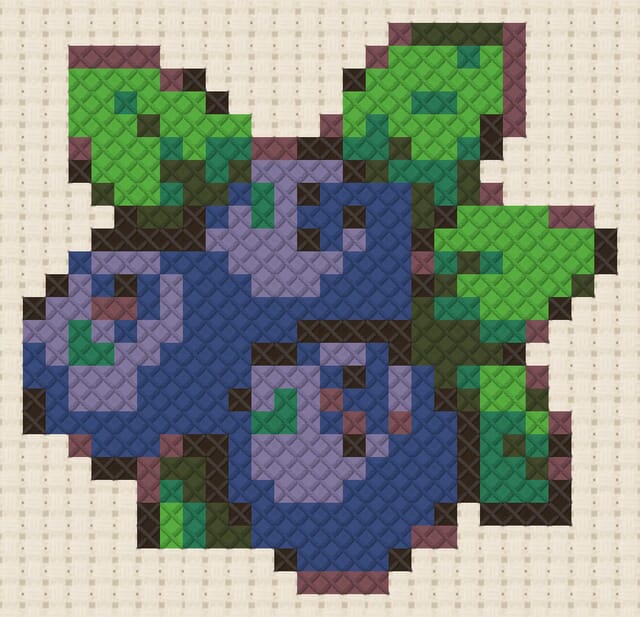 Blueberries finished in cross stitch on Aida cloth