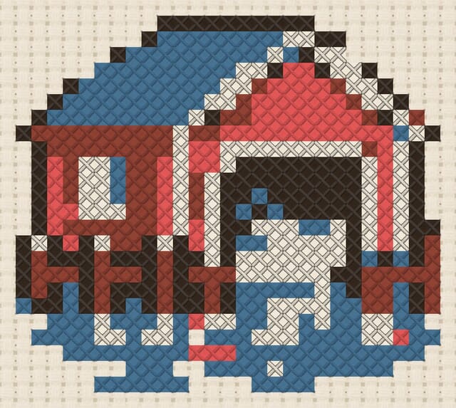 Boathouse finished in cross stitch on Aida cloth