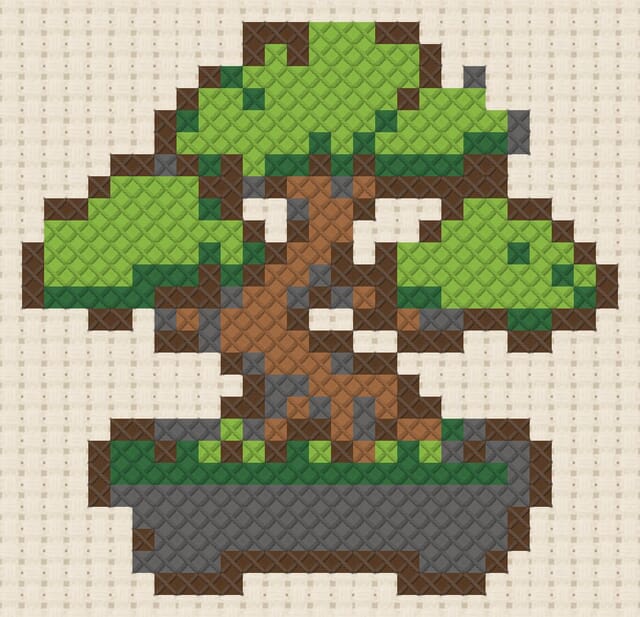 Bonsai finished in cross stitch on Aida cloth