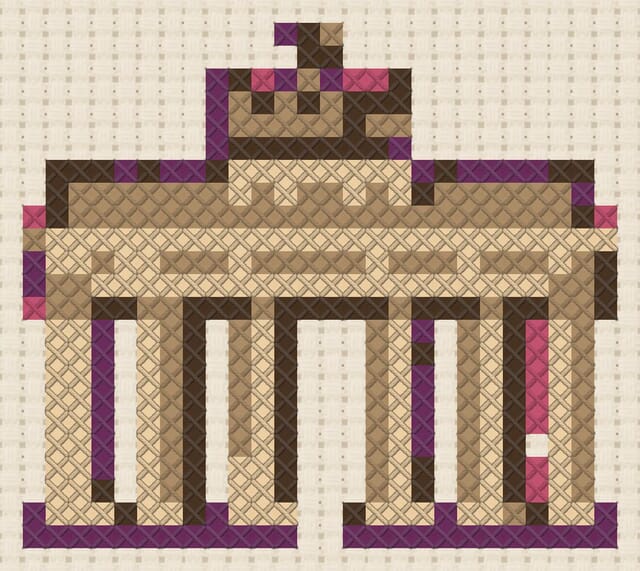 Brandenburg Gate finished in cross stitch on Aida cloth