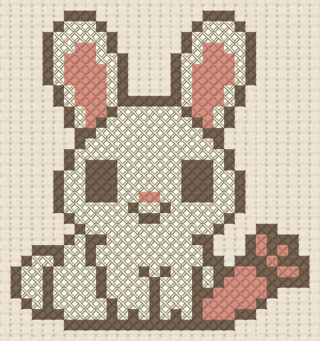 Bunny finished in cross stitch on Aida cloth