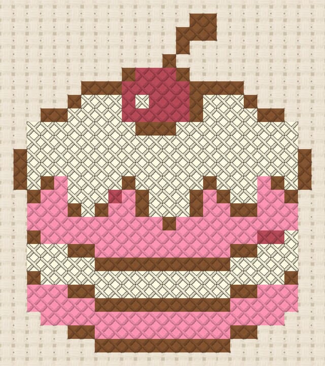 Cake finished in cross stitch on Aida cloth