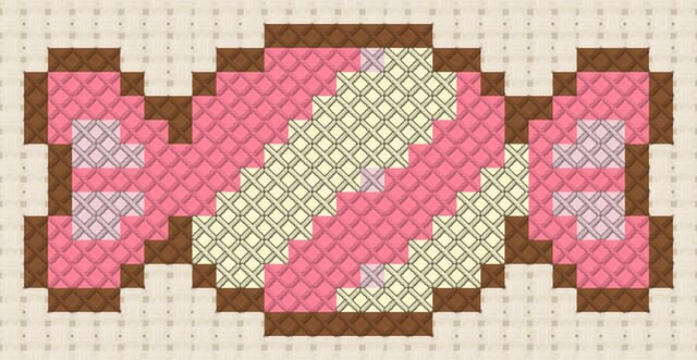 Candy finished in cross stitch on Aida cloth