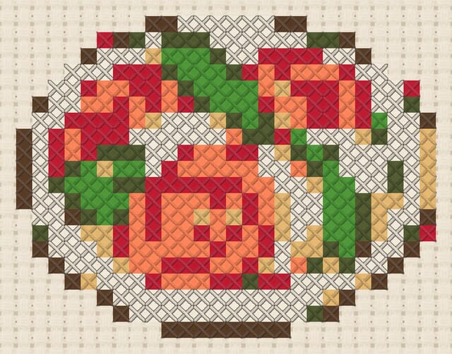 Caprese salad finished in cross stitch on Aida cloth