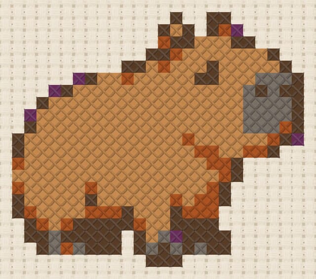 Capybara finished in cross stitch on Aida cloth