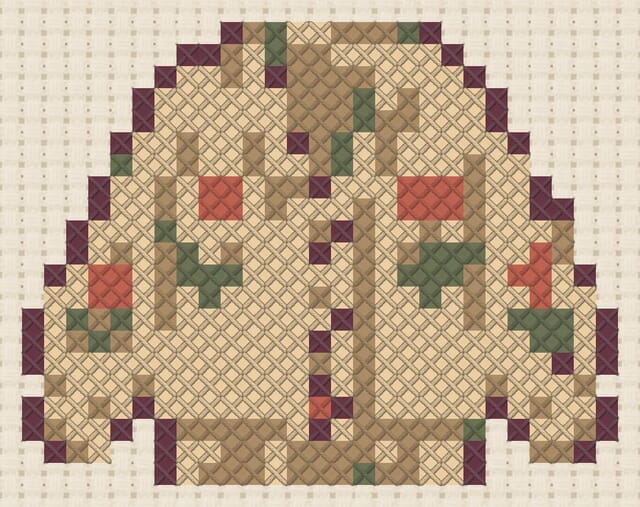 Cardigan finished in cross stitch on Aida cloth