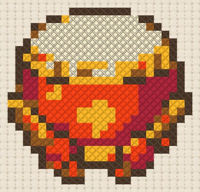 Celebration drum finished in cross stitch on Aida cloth