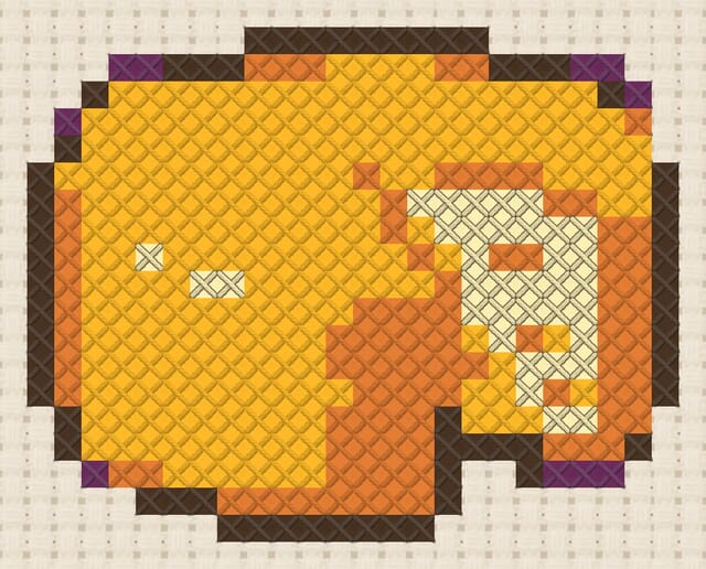 Cheese wheel finished in cross stitch on Aida cloth