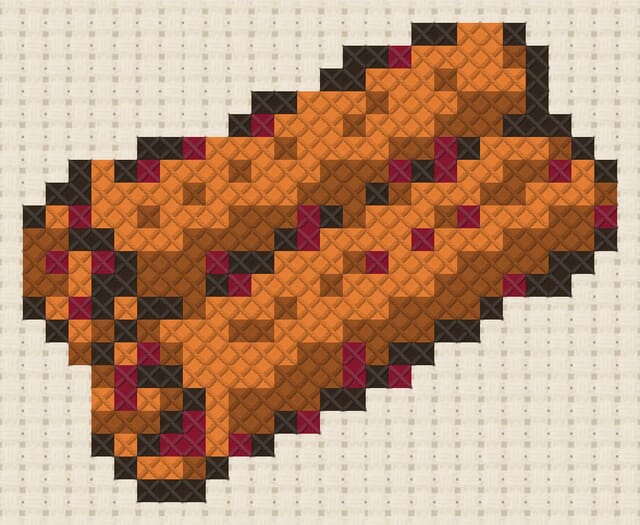Cinnamon sticks finished in cross stitch on Aida cloth