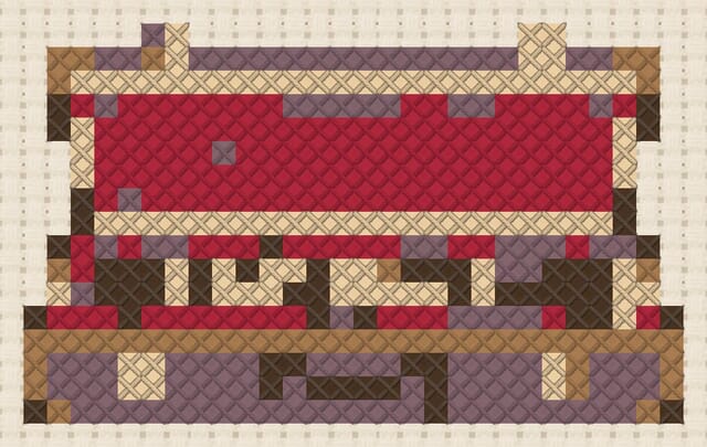 Clarinet in its case finished in cross stitch on Aida cloth