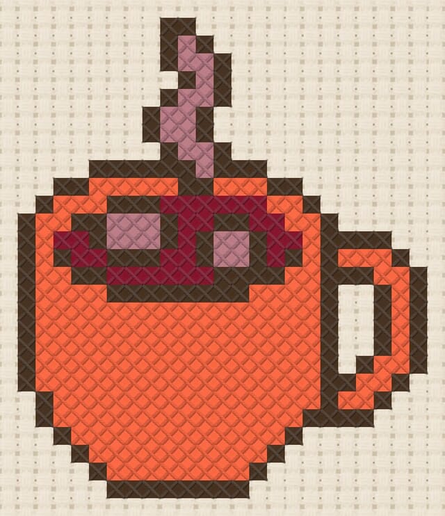 Hot cocoa finished in cross stitch on Aida cloth