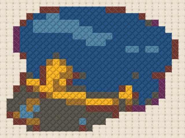 Conductor hat finished in cross stitch on Aida cloth