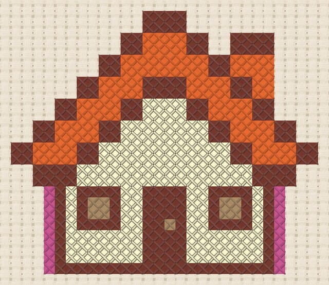 Cottage finished in cross stitch on Aida cloth