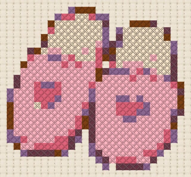 Cozy slippers finished in cross stitch on Aida cloth