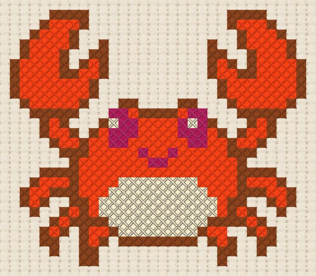 Crab finished in cross stitch on Aida cloth
