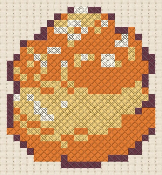 Cream puff finished in cross stitch on Aida cloth