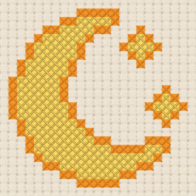 Crescent moon with stars finished in cross stitch on Aida cloth