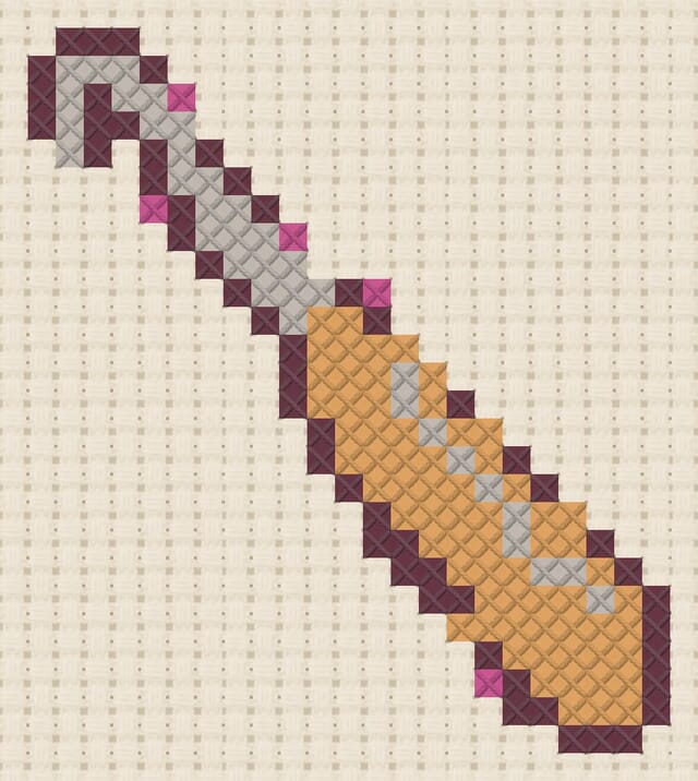 Crochet hook finished in cross stitch on Aida cloth