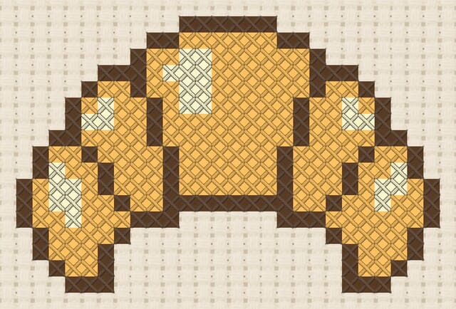 Croissant finished in cross stitch on Aida cloth