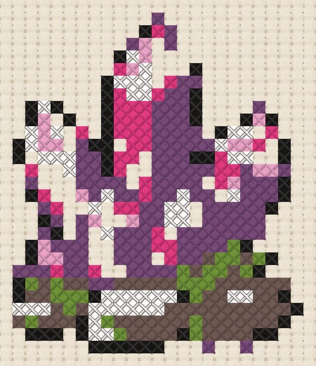 Crystal cluster finished in cross stitch on Aida cloth