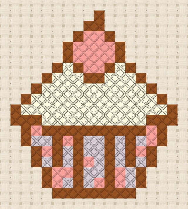 Cupcake finished in cross stitch on Aida cloth