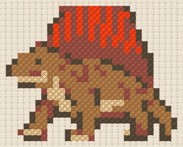 Dimetrodon finished in cross stitch on Aida cloth