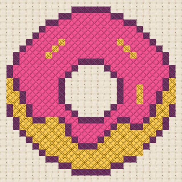 Donut finished in cross stitch on Aida cloth
