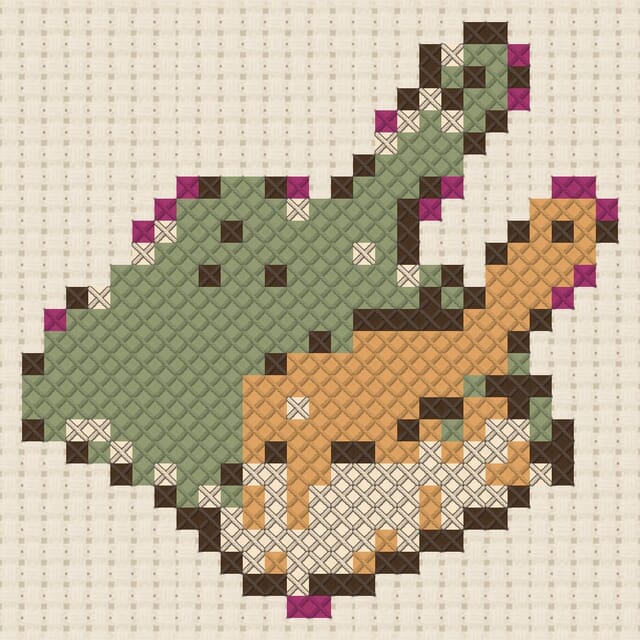 Dustpan brush finished in cross stitch on Aida cloth